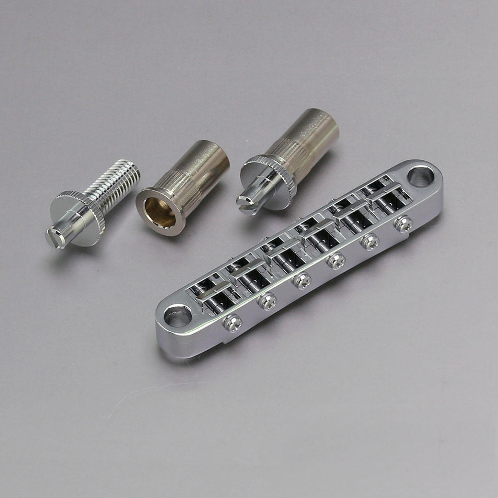 Are the saddles pre-notched? What material are the intonation screws and what type of screw head to they have?